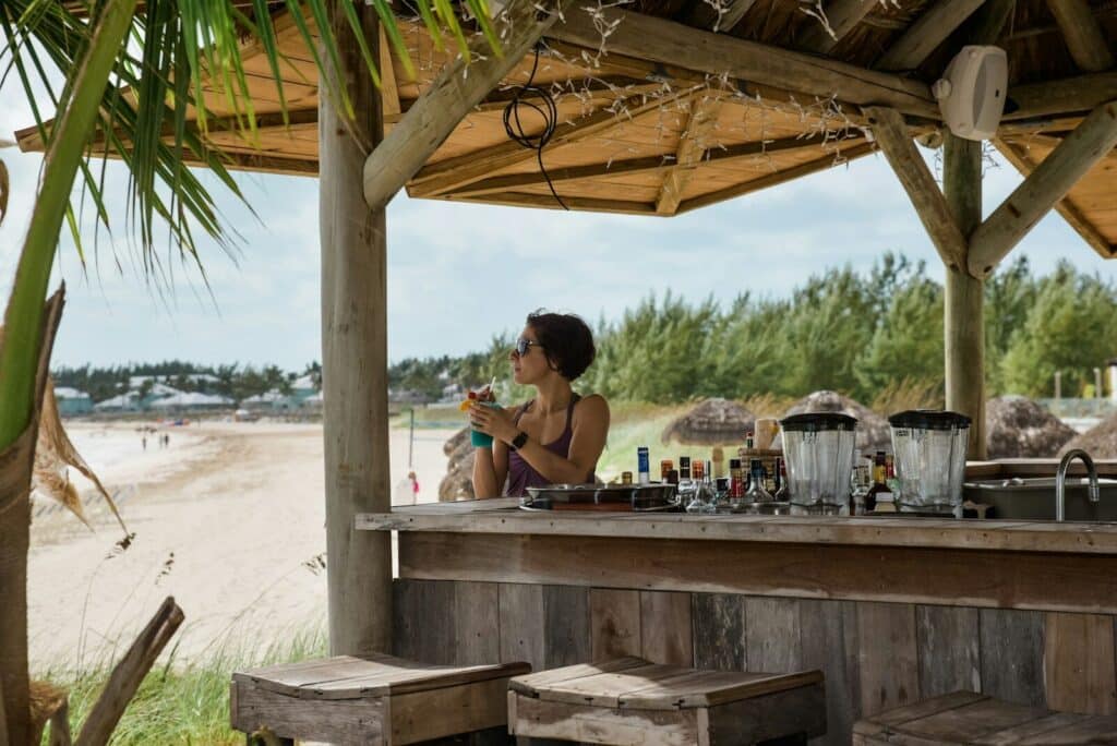 man in black t-shirt sitting on chair