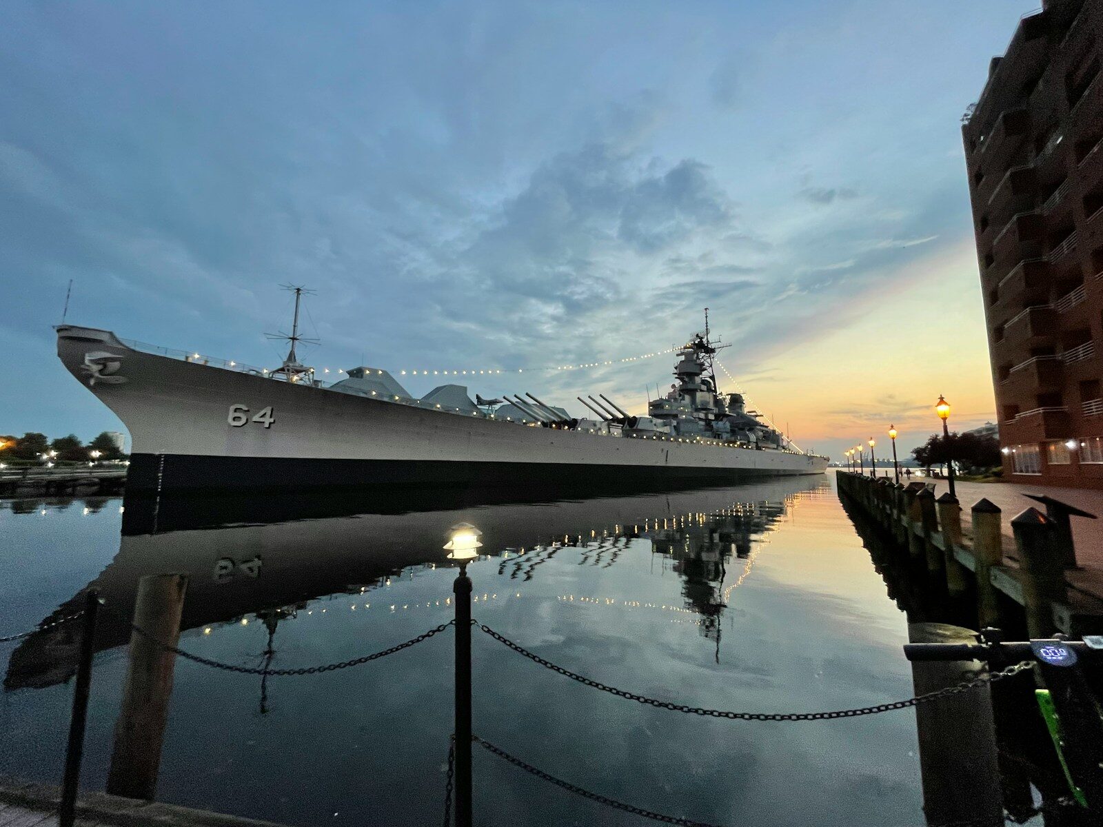 a large ship is docked in the water
