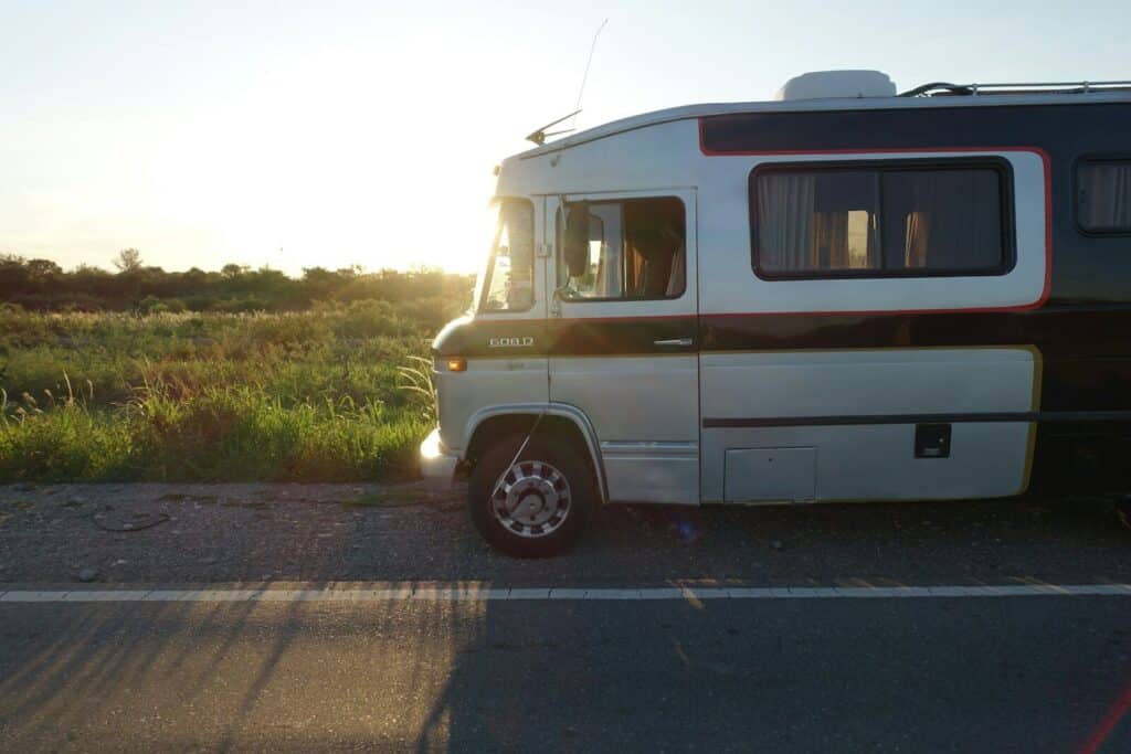white and brown van on road during daytime