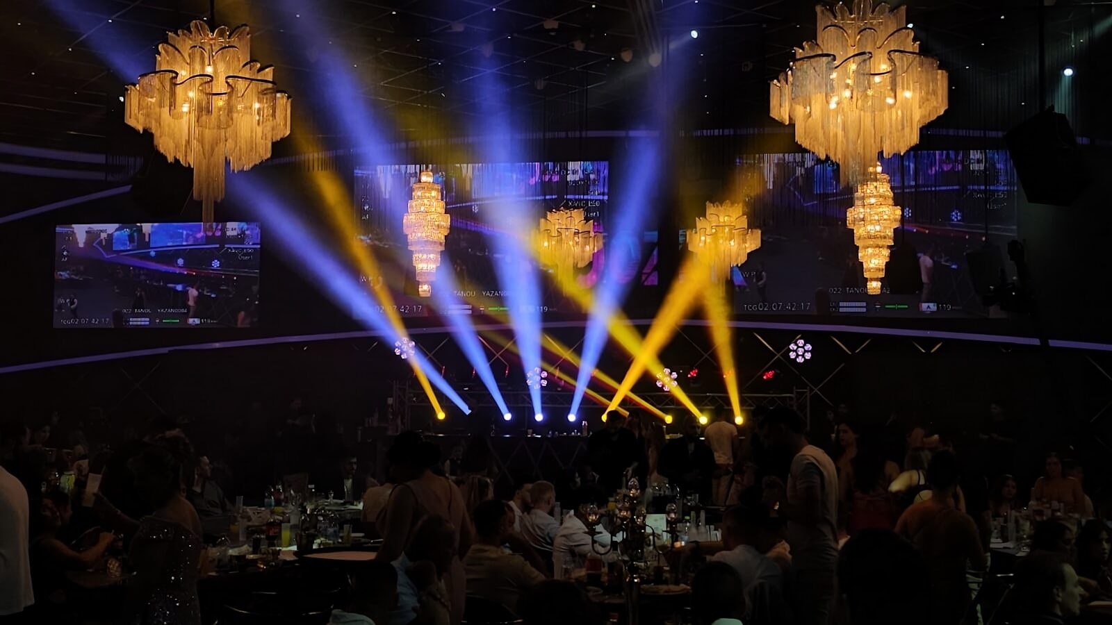A glamorous event space with chandeliers and spotlights. The Best Dinner Shows Myrtle Beach Based to Add to Your Vacation