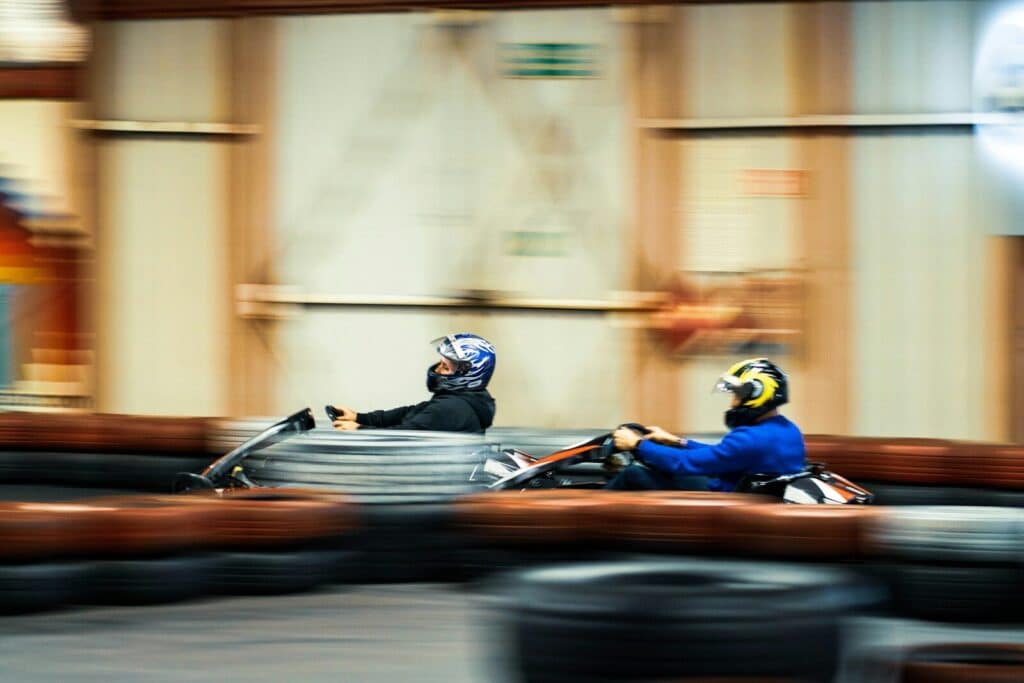 a blurry photo of two people on a motorcycle