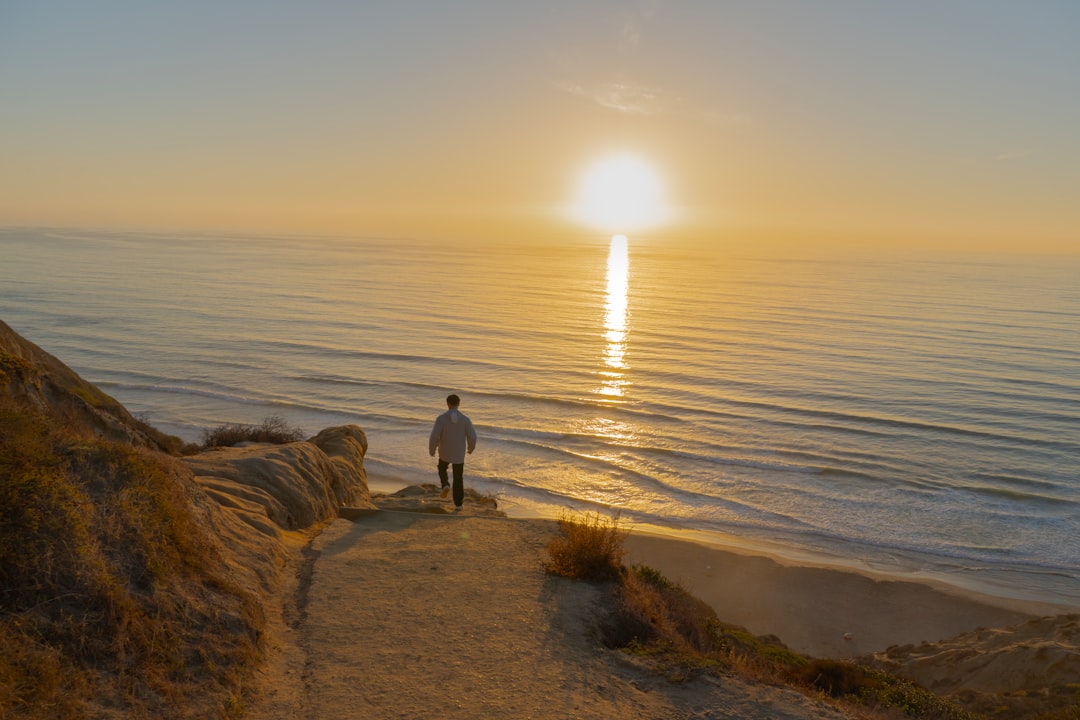 2. Take a Sunrise Walk Along the Ocean