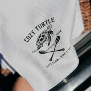 Cozy Turtle Waffle Towel white with black corner logo